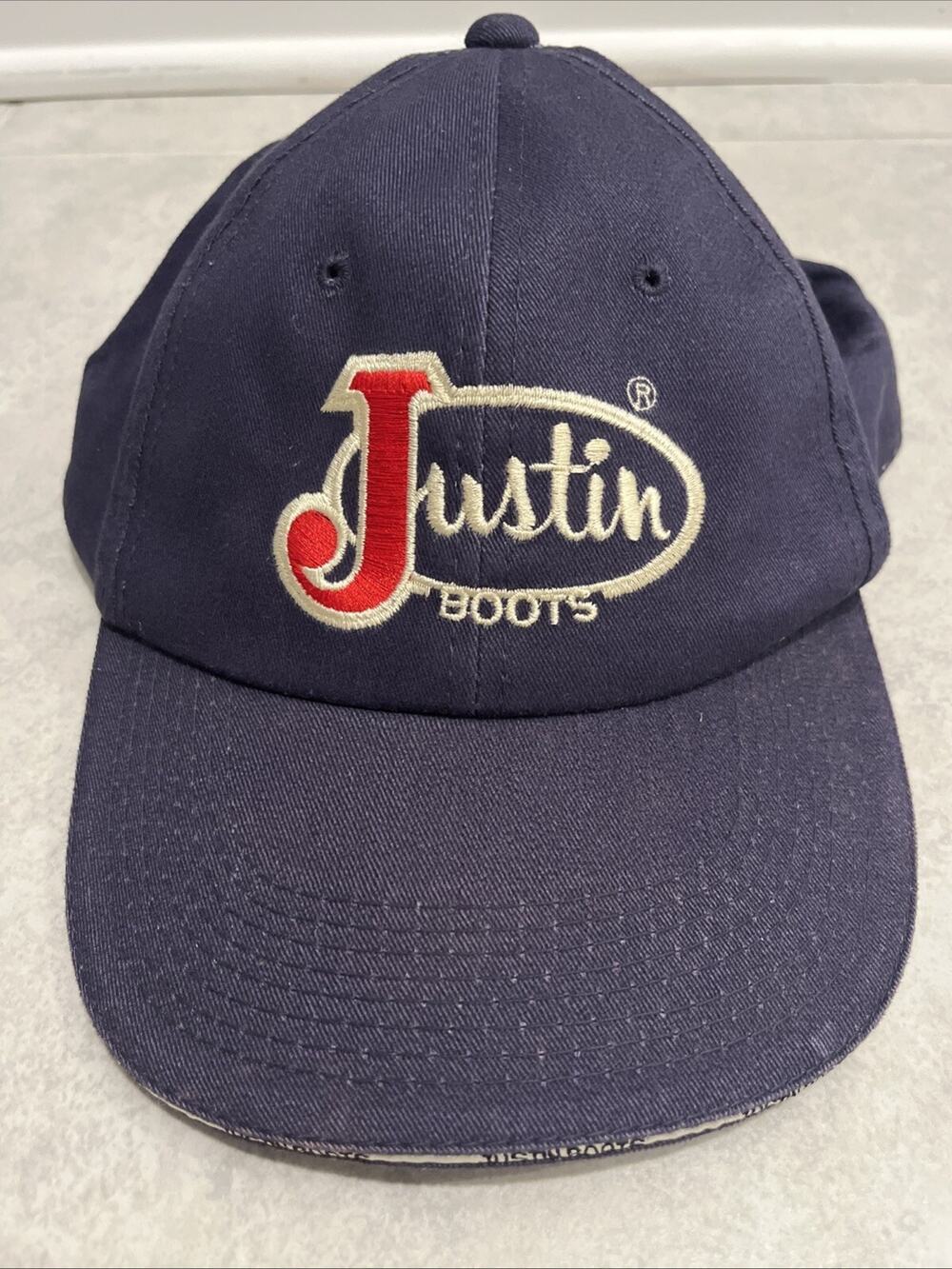 Justin Boots Strapback Hat Baseball Cap Navy Blue Embroidered Logo Cowboy